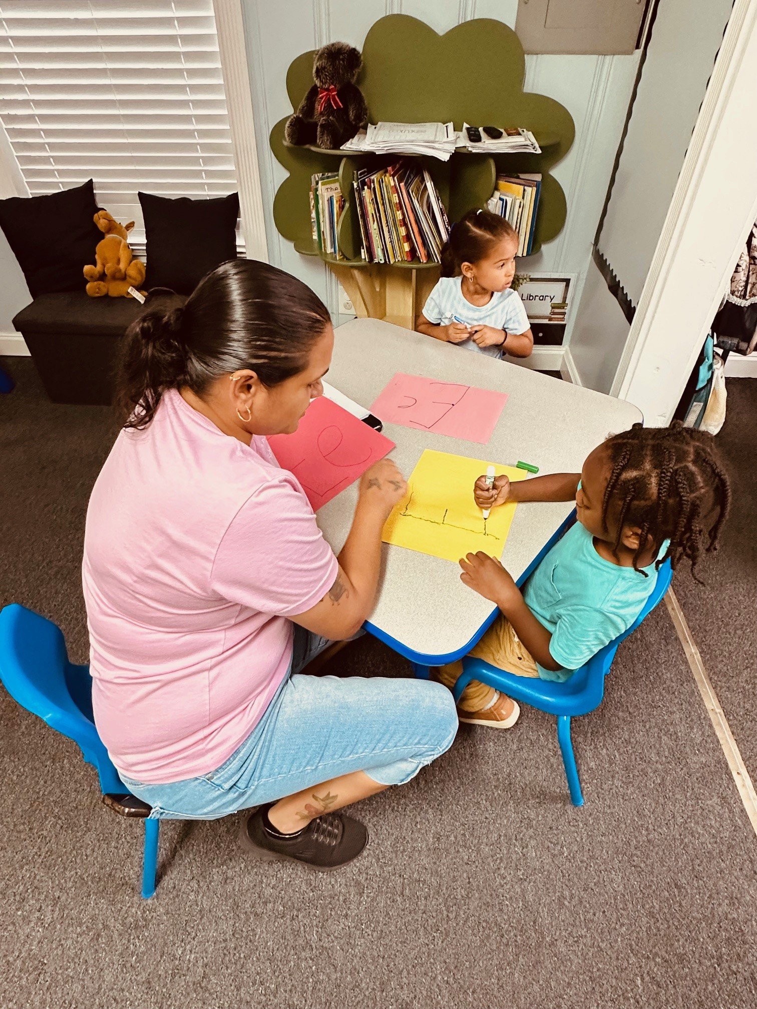 Child playing with toys in the classroom
